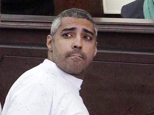 Mohammed Fahmy appears in a Cairo courtroom on March 31, 2014. THE CANADIAN PRESS/AP, Heba Elkholy, El Shorouk