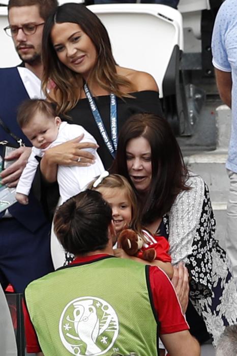 Wales' Gareth Bale meets his wife Emma Rhys-Jones and family before the match