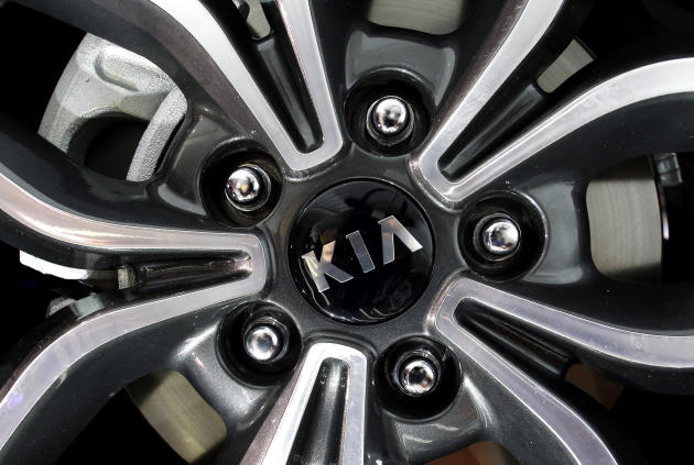 FILE - This Feb. 7, 2013 file photo shows a wheel on a Kia vehicle during the media preview of the Chicago Auto Show at McCormick Place in Chicago. Kia placed ninth on Consumer Reports magazine's list of top auto brands, released Tuesday, Feb. 24, 2015. (AP photo/Nam Y. Huh, File)