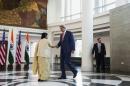 U.S. Secretary of State Kerry greets Indian External Affairs Minister Swaraj (L) in New Delhi