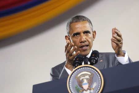 U.S. President Barack Obama participates in a town hall meeting with young Caribbean leaders at the University of the West Indies in Kingston, Jamaica April 9, 2015. REUTERS/Jonathan Ernst