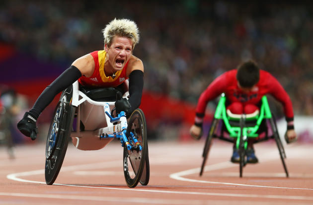 LONDON, ENGLAND - SEPTEMBER 05: Marieke Vervoort of Belgium celebrates as she wins gold in the Women's 100m T52 Final on day 7 of the London 2012 Paralympic Games at Olympic Stadium on September 5, 2012 in London, England. (Photo by Michael Steele/Getty Images)