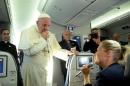 Pope Francis speaks to journalists during a press   conference on the plane after his visit to Krakow, for the World Youth Days