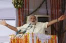 India's Prime Minister Modi addresses his supporters   during a rally in Mathura