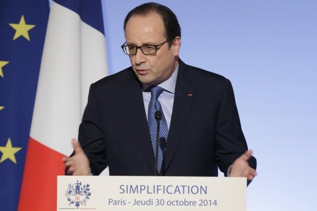 Le gouvernement français attend 11 milliards d'euros de gains pour l'économie d’ici 2017 du "choc de simplification" lancé il y a 18 mois et dont une nouvelle salve de mesures a été annoncée jeudi par François Hollande. /Photo prise le 30 octobre 2014/REUTERS/Philippe Wojazer