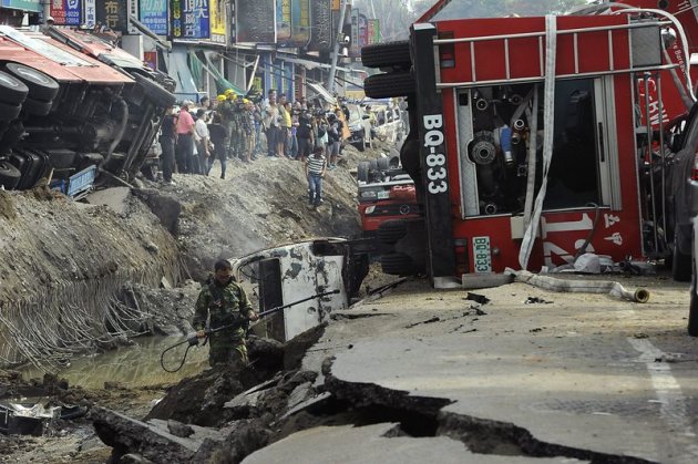 Des explosions en série dues à une fuite de gaz ont dévasté vendredi tout un quartier de Kaohsiung, la deuxième plus grande ville de Taiwan, dans le sud de l'île, faisant au moins 25 morts et 267 blessés, selon un nouveau bilan communiqué par les autorités. /Photo prise le 1er août 2014/REUTERS/Michael Wang