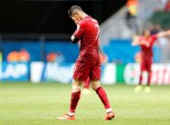 Cristiano Ronaldo de Portugal reacciona al final del partido contra Ghana por el Grupo G del Mundial 2014 en el Estadio Nacional de Brasilia. 26 junio, 2014. A continuación, el equipo conformado por las grandes decepciones del Mundial, según los periodistas de Reuters: Iker Casillas (España); Dani Alves (Brasil), Sergio Ramos (España), Pepe (Portugal), Benoit Assou-Ekotto (Camerún); Eden Hazard (Bélgica), Shinji Kagawa (Japón), Alex Song (Camerún); Fred (Brasil), Mario Balotelli (Italia) y Cristiano Ronaldo (Portugal) REUTERS/Ueslei Marcelino