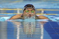 Japan's Naoya Tomita swims during his men's 50m breaststroke at the 17th Asian Games in Incheon, South Korea, Friday, Sept. 26, 2014.(AP Photo/Rob Griffith)