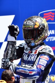 Spain's 2010 world champion Jorge Lorenzo celebrates on the podium after winning the Italian MotoGP a the Mugello Circuit near Scarperia on July 15, 2012. The 25-year-old Yamaha rider - who ended a two race winless run having last won the British MotoGP on June 17 - came home clear of compatriot Dani Pedrosa on a Honda while Italian Andrea Dovizioso was third on another Yamaha.  AFP PHOTO / GIUSEPPE CACACEGIUSEPPE CACACE/AFP/GettyImages