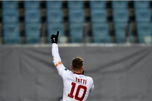 Roma's forward Francesco Totti celebrates scoring a goal at Khimki arena outside Moscow on November 25, 2014