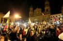 Supporters of the peace deal signed between the   government and the Revolutionary Armed Forces of Colombia (FARC) rebels gather at   Bolivar Square during a march for peace in Bogota