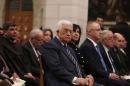 Palestinian President Mahmoud Abbas attends a   Christmas Midnight Mass at the Church of the Nativity in the West Bank town of   Bethlehem