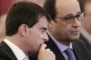 Confiance: Hollande stable à 18%, Valls recule à 31%