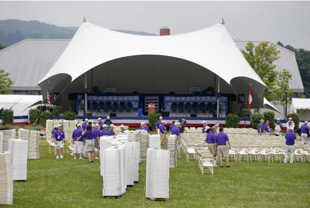 Workers set up chairs at the Clark Sports Center ahead of this afternoon's Baseball Hall of Fame induction ceremonies on Sunday, July 27, 2014, in Cooperstown, N.Y. (AP Photo/Mike Groll)