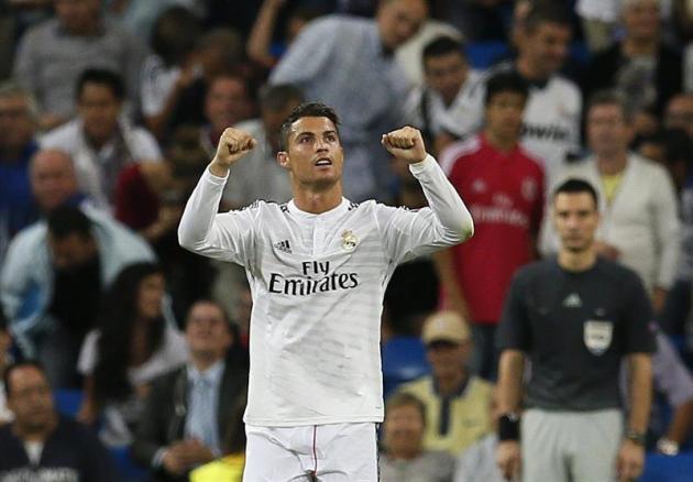 GRA552. MADRID. 16/09/2014.- El delantero portugués del Real Madrid Cristiano Ronaldo celebra su gol, tercero del equipo, durante el partido de la primera jornada de la fase de grupos de la Liga de Ca