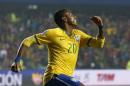 Brazil's Robinho celebrates after scoring the opening goal against Paraguay during a Copa America quarterfinal soccer match at the Ester Roa Rebolledo Stadium in Concepcion, Chile, Saturday, June 27, 2015. (AP Photo/Silvia Izquierdo)