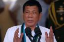 Philippine President Rodrigo Duterte speaks during   the change of command for the new Armed Forces chief at a military camp in Quezon   city, Metro Manila