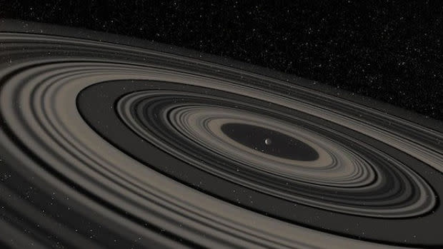 la "super-Saturne" Vue-d-artiste-de-l-exoplanete-et-de-son-systeme-d-anneaux-geant_68871_w620