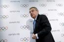 IOC President Bach leaves after a news conference in   Lausanne