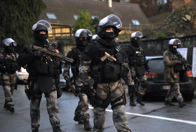 French police storm Marseille estate after gun shots fired in air.