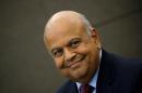 South African Finance Minister Pravin Gordhan attends   media briefing in Johannesburg