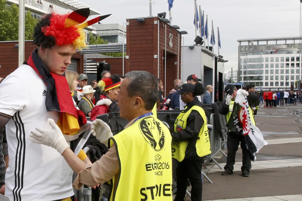 Football Soccer - Euro 2016 - Germany team fan goes through security check