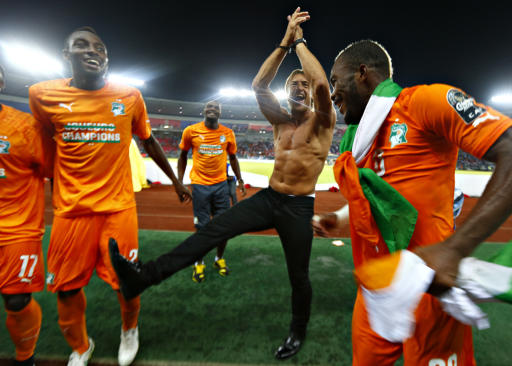 Ivory Coast's head coach Renard celebrates with his players after winning the African Nations Cup final match against Ghana in Bata