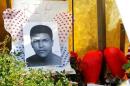 Fans of Muhammad Ali, the former world heavyweight   boxing champion leave pictures and personal mementos as they pay their respects at   the Ali Center in Louisville