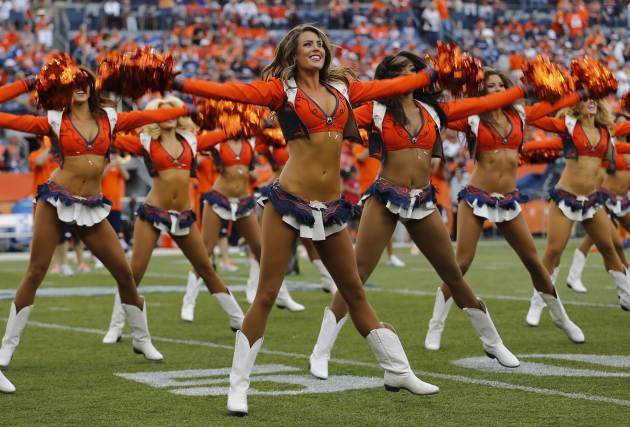 The Denver Broncos cheerleaders perform prior to an NFL football game against the Indianapolis Colts, Sunday, Sept. 7, 2014, in Denver. (AP Photo/Jack Dempsey)