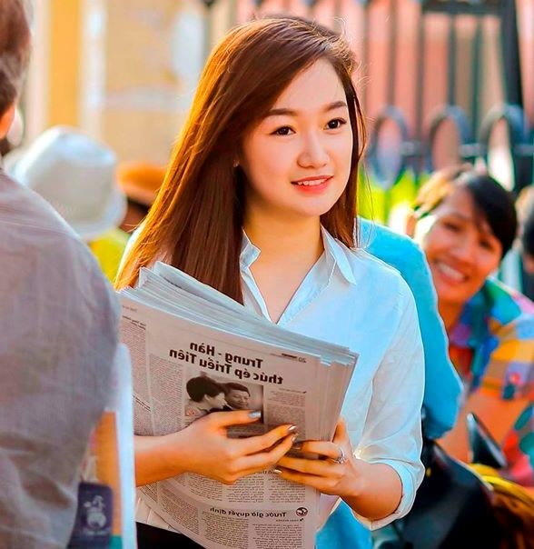 Cô gái bán báo dạo trong kỳ thi ĐH ở Sài Gòn gây xôn xao Co-gai-ban-bao-gay-xon-xao-cong-dong-mang2