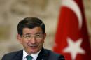 Turkish Prime Minister Davutoglu speaks during a   meeting with representatives of foreign media in Istanbul, Turkey