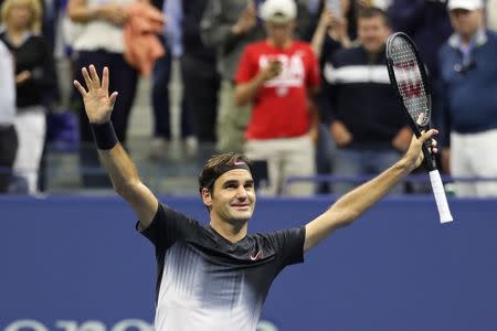 Aug 29, 2017; New York, NY, USA; Roger Federer of Switzerland celebrates after match point against Frances Tiafoe of the United States (not pictured) on day two of the U.S. Open tennis tournament at USTA Billie Jean King National Tennis Center. Mandatory Credit: Geoff Burke-USA TODAY Sports