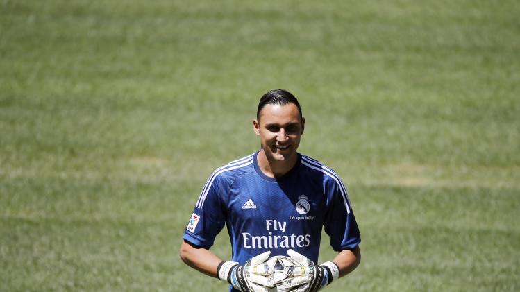 Download this Real Madrid New Goalkeeper Keylor Navas Costa Rica Poses During picture