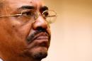 Sudanese President al-Bashir addresses a news   conference in Cape Town