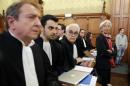 Managing Director of the International Monetary Fund   Christine Lagarde is seen before the start of her trial about a state payout in   2008 to a French businessman, at the courts in Paris