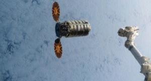 This still image taken from NASA TV shows acommercial cargo ship named Cygnus about to connect to the International Space Station on Saturday, March 26, 2016.  It&#39;s the first of three shipments coming up in quick succession. A Russian cargo ship will lift off in a few days, followed by a SpaceX supply run on April 8. NASA has turned to private industry to keep the space station stocked.   (NASA via AP)