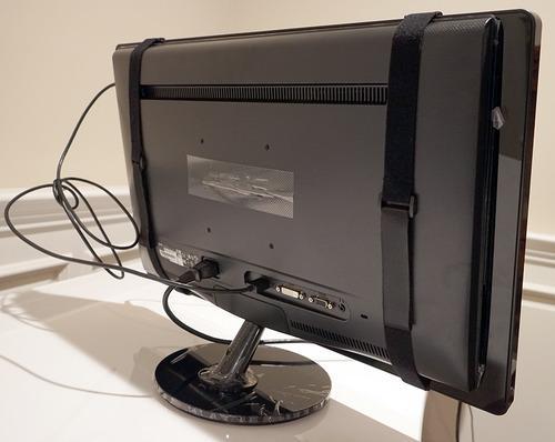 Back of monitor showing straps holding on Zmartframe