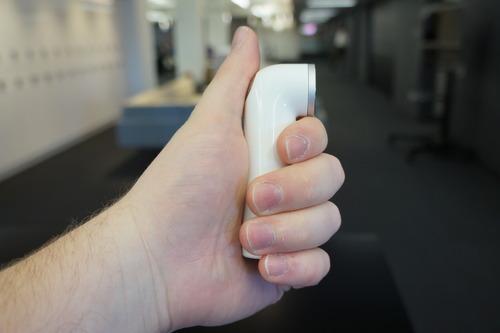 HTC Re mini-camera in a hand