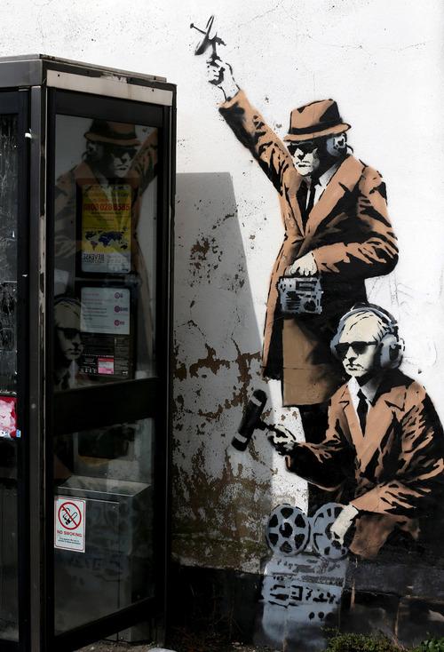 Seven-Figure Banksy <em>Spy Booth</em> Vandalized