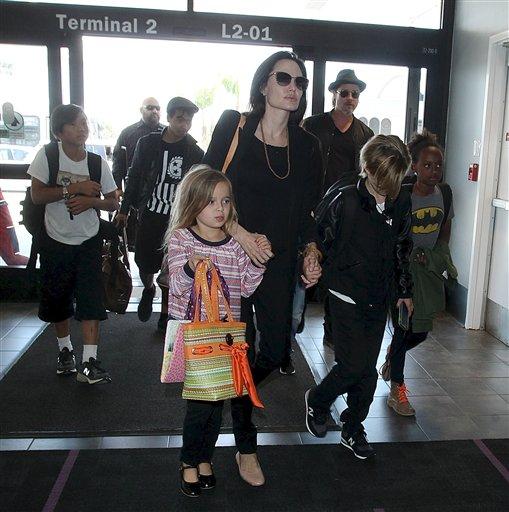 This Is Why Celebrities Fly Coach. Jolie fly economy