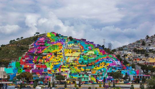 Street Artists Paint An Entire Town Into A Massive Rainbow To Unite Community