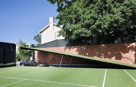 This Mansion’s Tennis Court Hides a ‘Batcave’ Secret