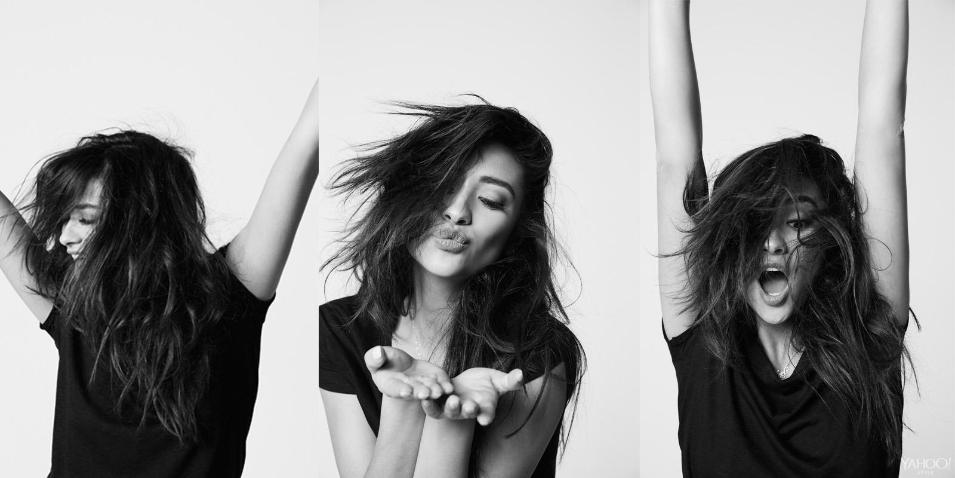 Shay Mitchell playing around in a black leather and linen Vince tee.