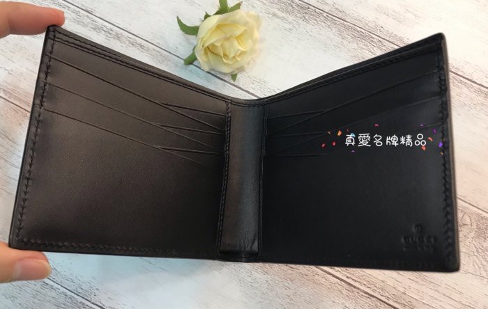 《真愛名牌精品》GUCCI 406693 黑色壓紋皮 對折 交叉短夾 **全新特價品**代購*