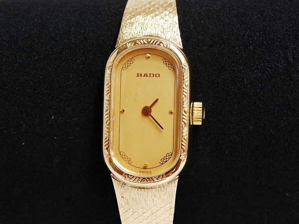 《寶萊精品》RADO 雷達金黃酒桶型手動女子錶