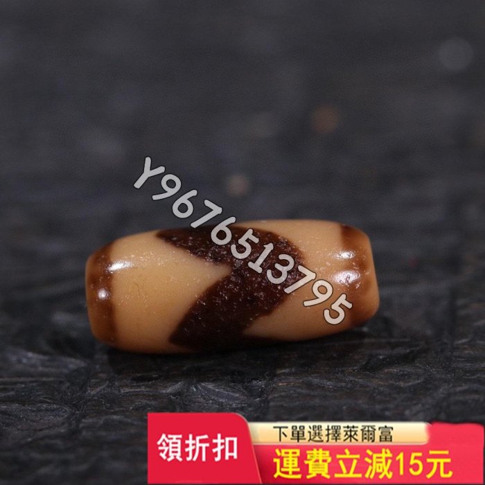 臺珠精品牙黃虎牙天珠 尺寸 ：22.0*10.5mm 精品藏 舊藏古玩 老物件 古董【華夏尋寶閣】1039