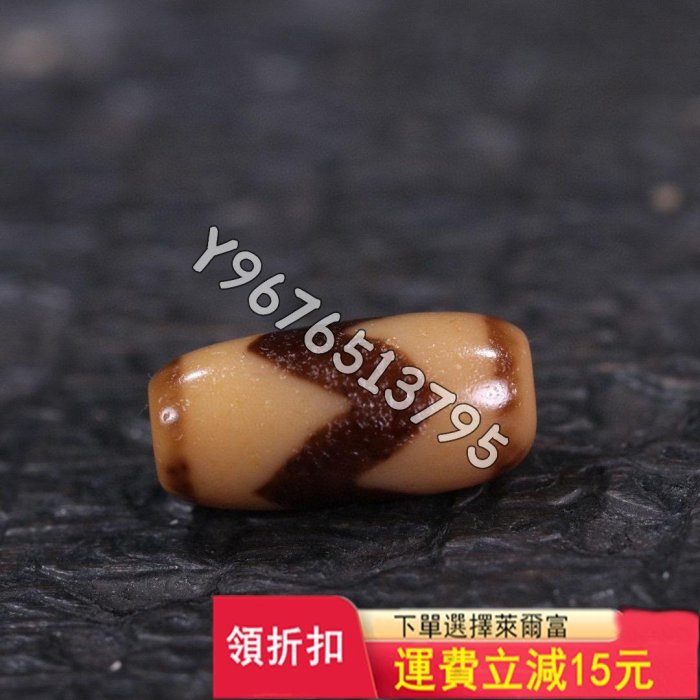 臺珠精品牙黃虎牙天珠 尺寸 ：22.0*10.5mm 精品藏 舊藏古玩 老物件 古董【華夏尋寶閣】1039