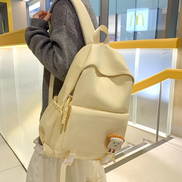 純色雙肩包男款簡約大容量旅行背包女韓版休閑初中高中生學生書包