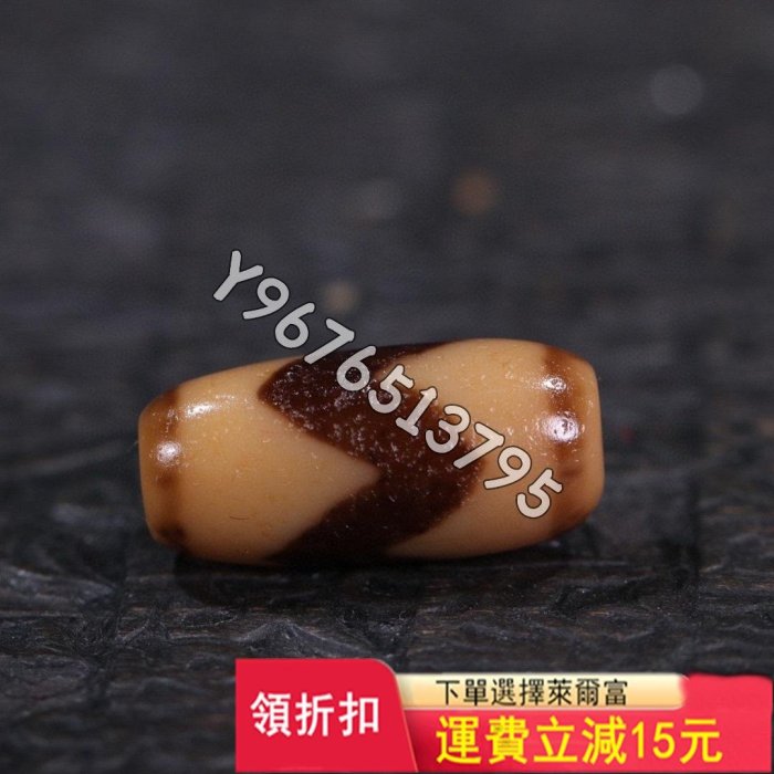 臺珠精品牙黃虎牙天珠 尺寸 ：22.0*10.5mm 精品藏 舊藏古玩 老物件 古董【華夏尋寶閣】1039