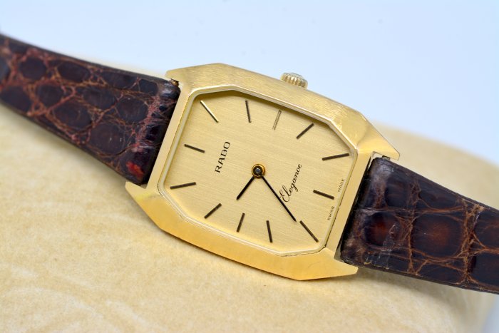 《寶萊精品》RADO 雷達表金黃長型手動女子錶